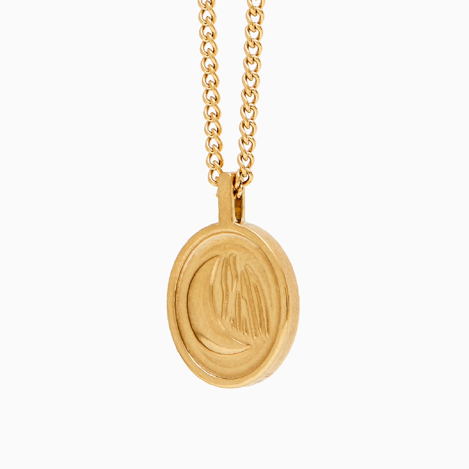 Reverso de la medalla Sentinel® dorada con el relieve de luna
