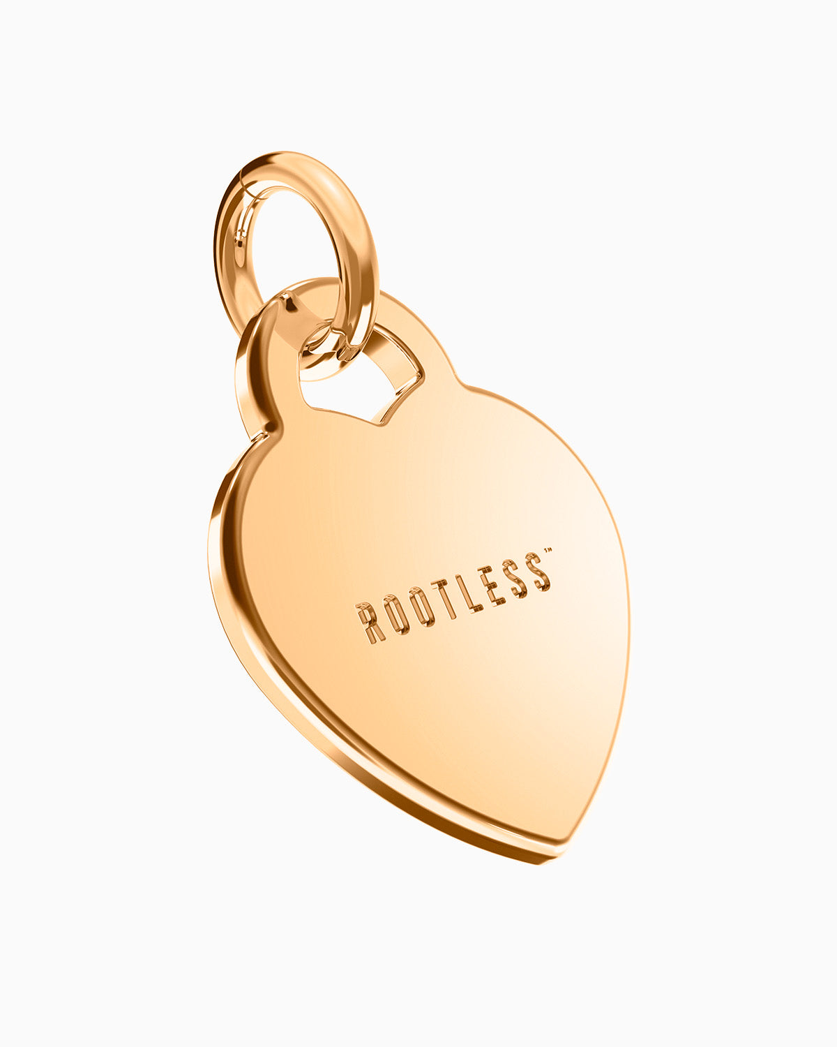 Colgante Corazón® en oro rosa con el logo ROOTLESS grabado en el reverso