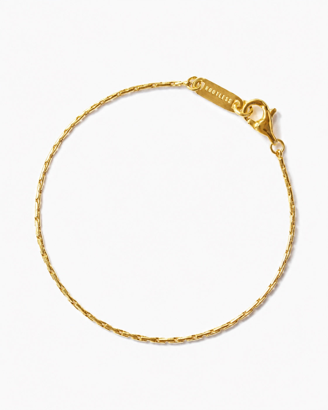 Pulsera Mamba® dorada de eslabón ultrafino con mosquetón y chapa ROOTLESS