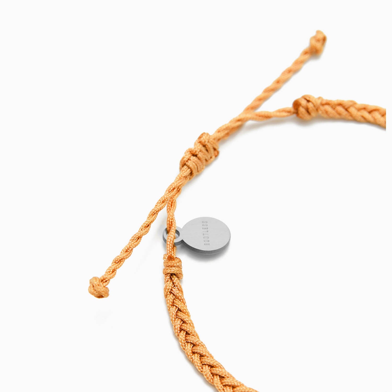 Detalle del cierre corredizo y el pequeño disco del cordón naranja de la MyWord®
